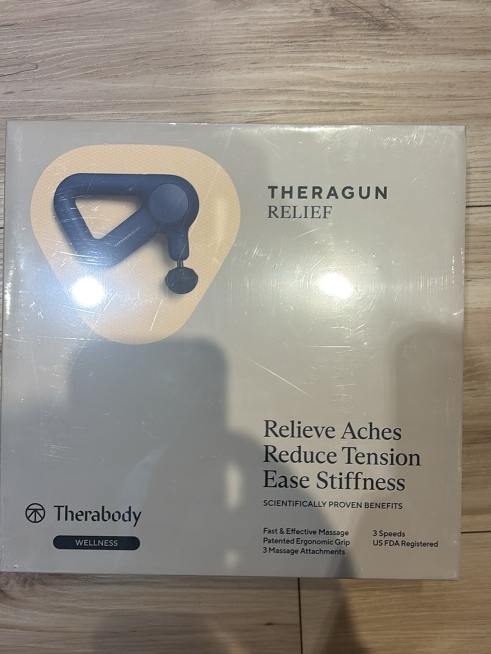 Therabody Boxed Device in White and Black Branding